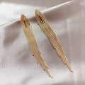 Regal Rediance Infinity Tassel Earrings